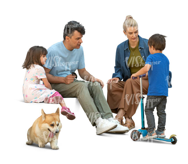 family with kids and a dog sitting and talking