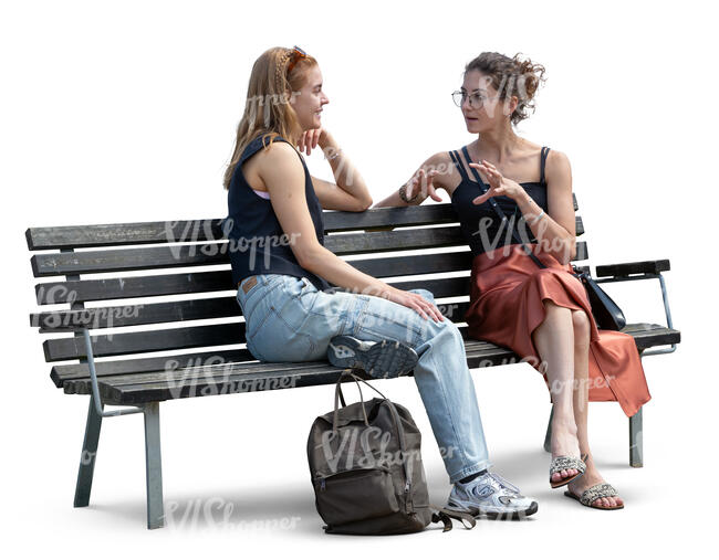 two women sitting on the bench and talking