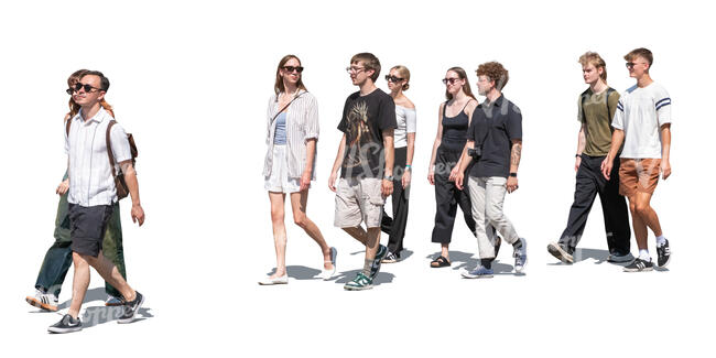 large group of young people walking in the street