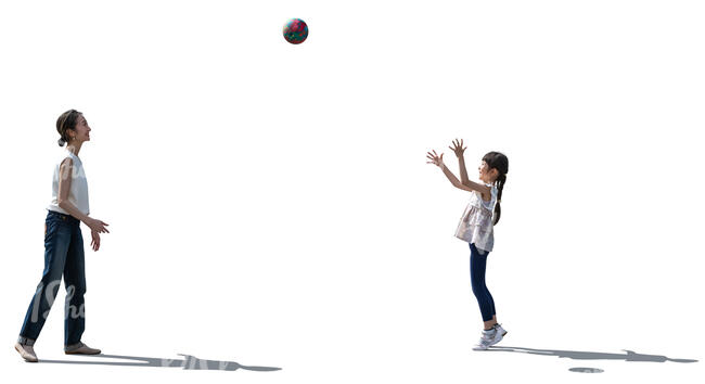 japanese woman and her daughter playing with a ball 