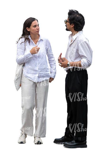 man and woman in white shirts standing and talking