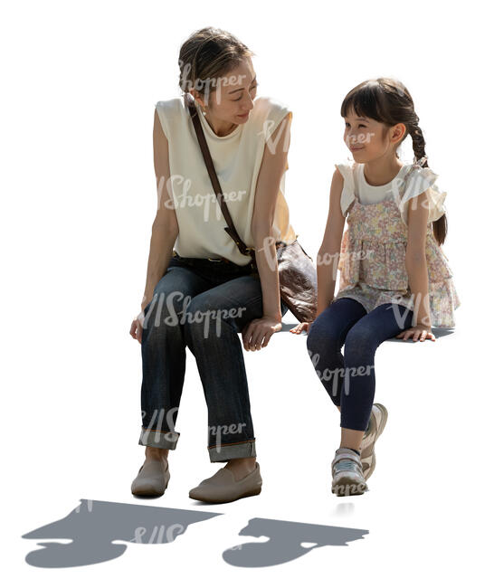 backlit image of a japanese woman and a child sitting