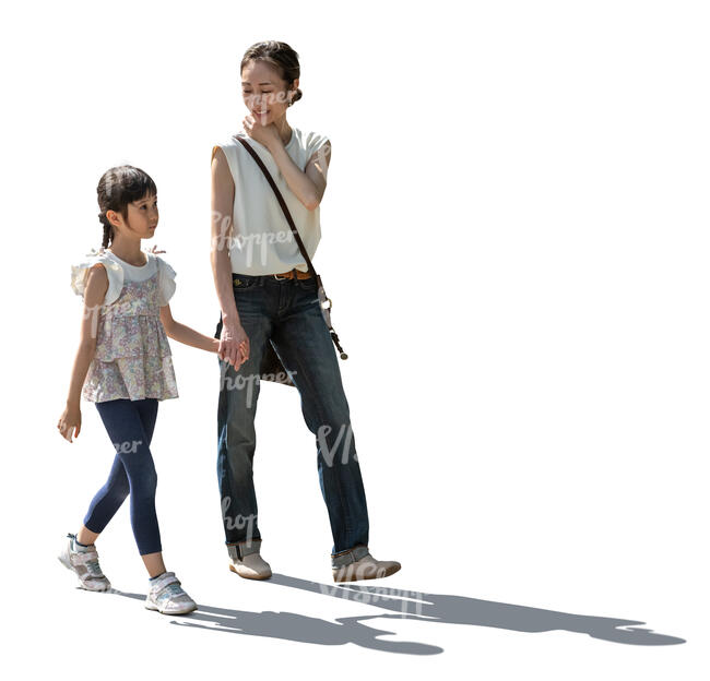 backlit image of a japanese woman and child walking hand in hand