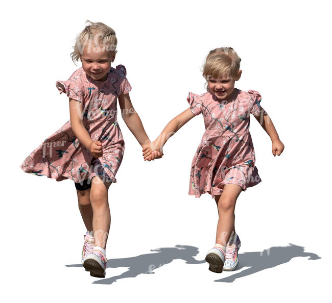 two little girls running hand in hand