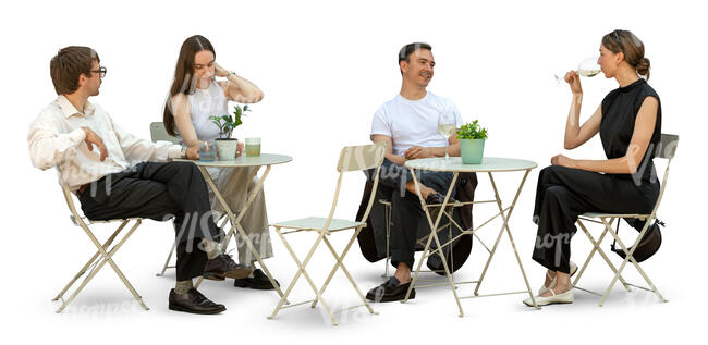 restaurant scene with young people sitting and drinking wine