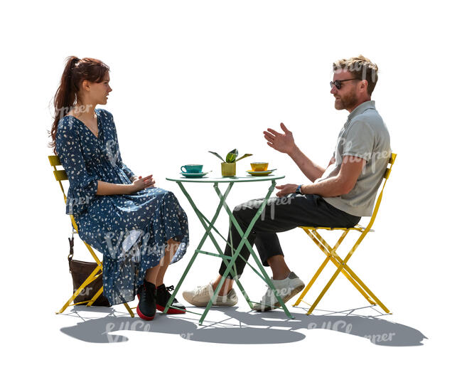 man and woman sitting in a modern cafe