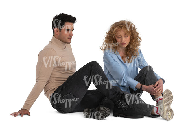 man and woman sitting on the floor together