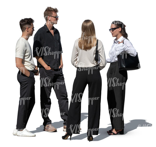 group of four people standing and talking