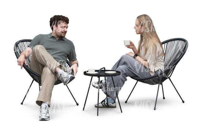 man and woman sitting in a cafe