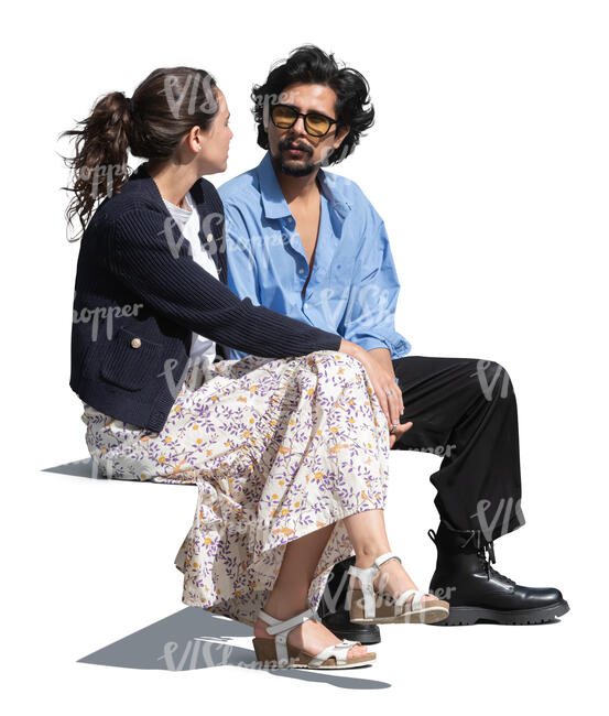 man and woman sitting together