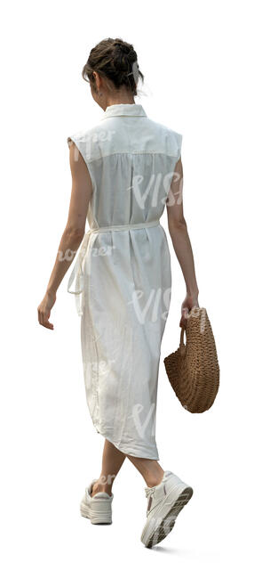 asian woman in a white dress walking