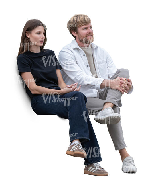man and woman sitting side by side