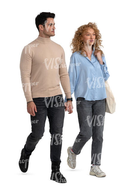 two people walking holding hands