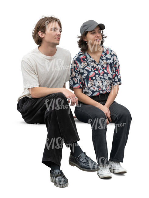 two people sitting side by side