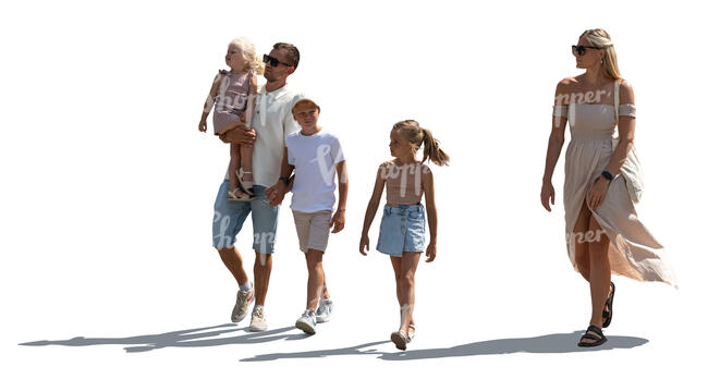 backlit family with three children walking