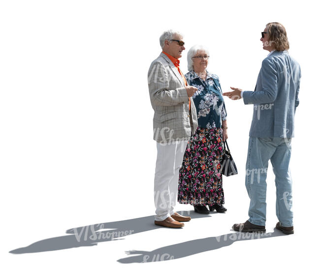 man talking to an elderly couple