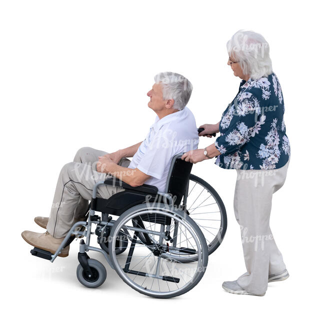 top view of an elderly woman helping a man in a wheelchair
