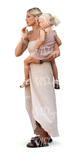 woman holding her daughter and looking out of the window
