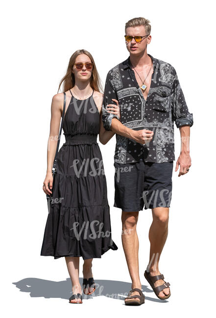 man and woman walking on sunny summer day