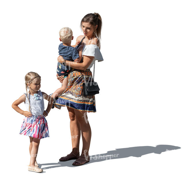 mother with two little children standing outside