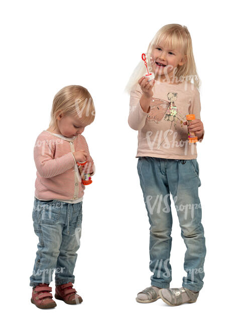 two children making soap bubbles