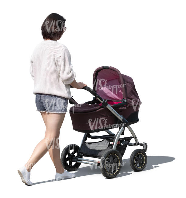 woman with a baby carriage walking