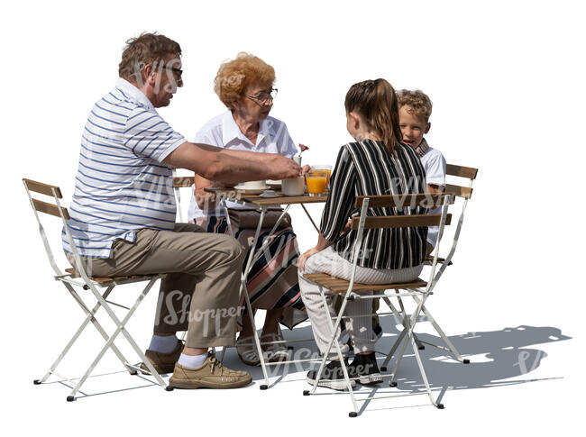 grandparents sitting in a cafe with their grandkids