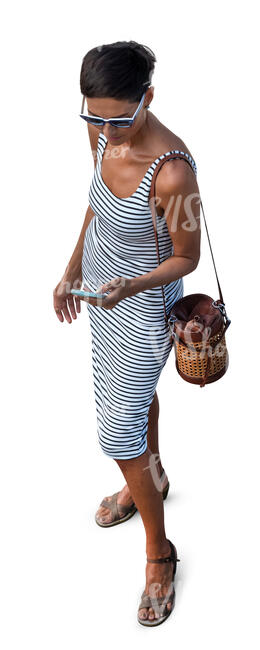 woman in a striped dress standing seen from above