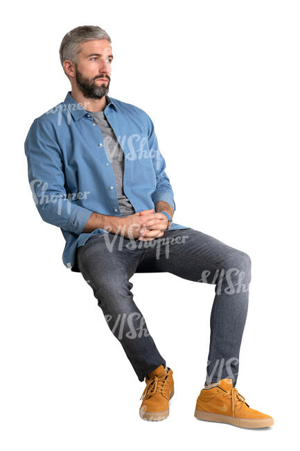 bearded man sitting