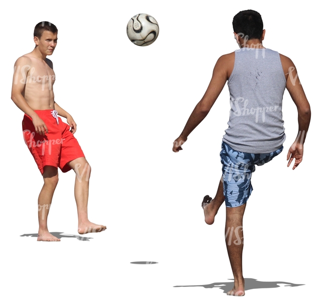two men playing football at the beach