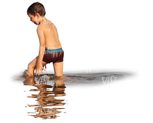 young boy swimming