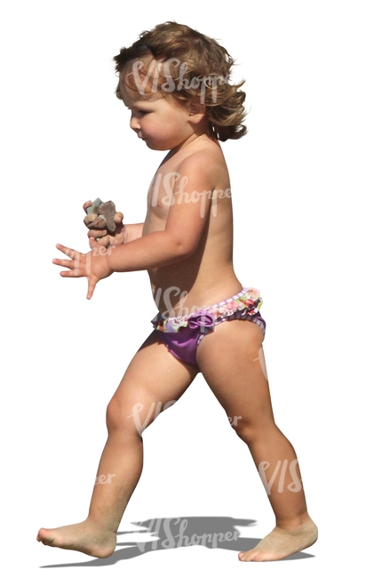 girl with an ice cream walking on the beach