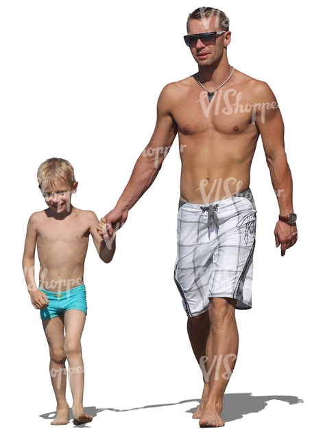 father and son walking on the beach