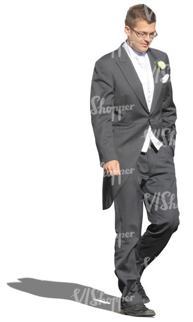 man in a fancy tuxedo walking