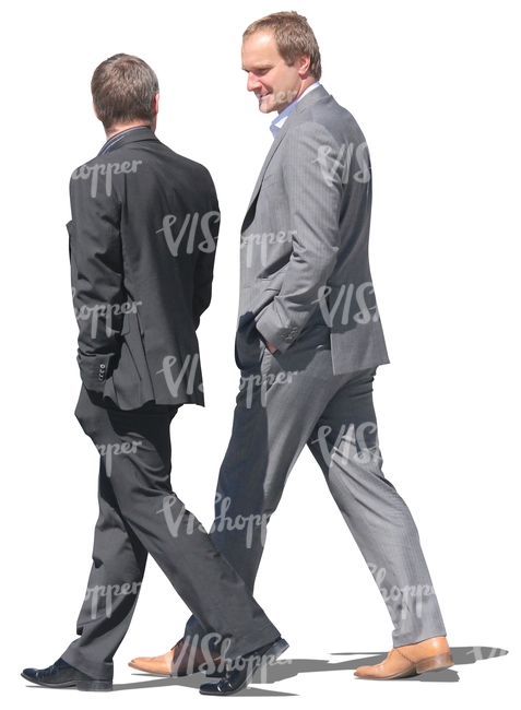 two men in formal suits walking