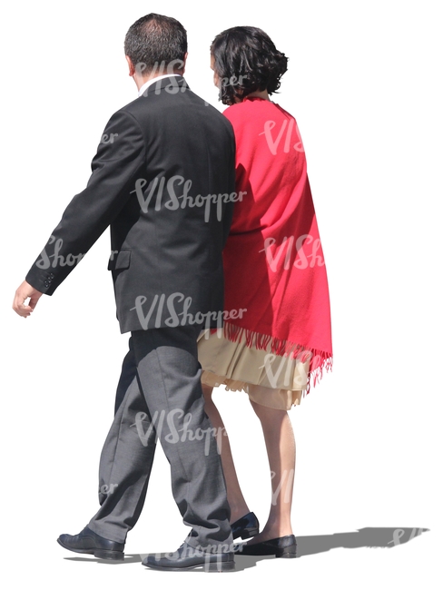fancy couple walking arm in arm