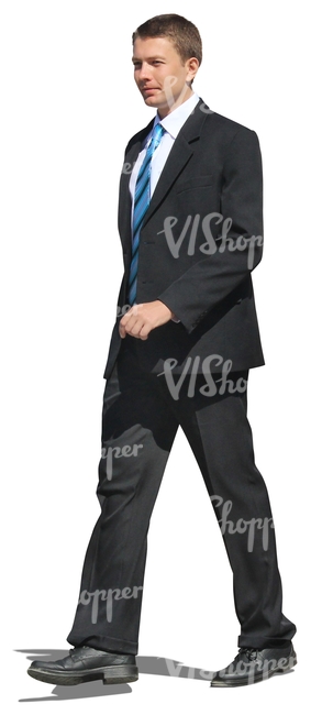 cut out man in a black suit walking