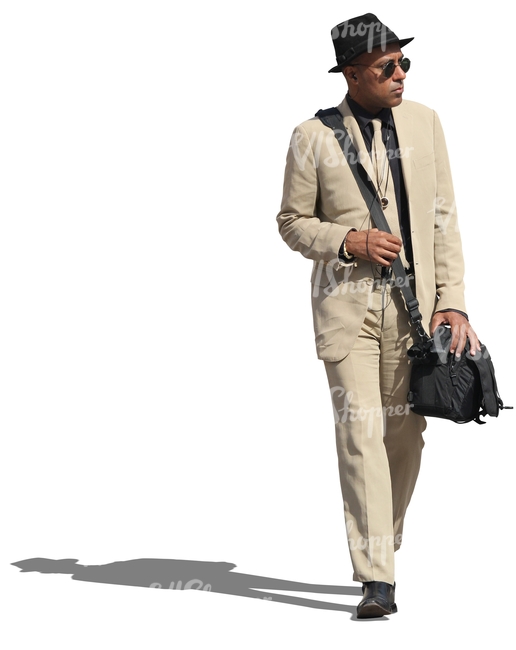 black man in a white suit and a hat