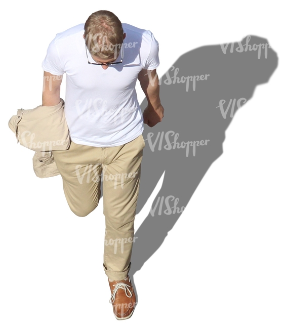 man with beige trousers walking