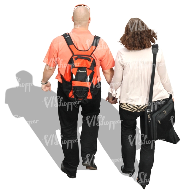 man and woman walking hand in hand