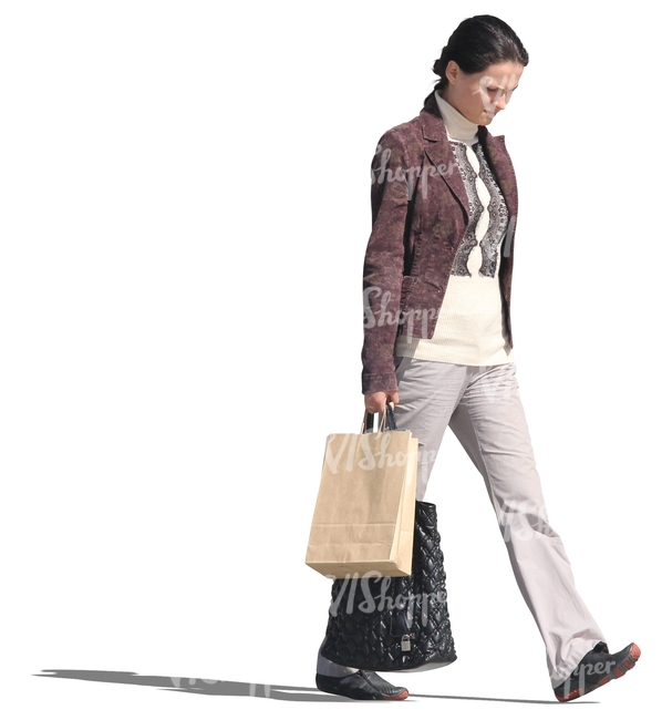 woman with two bags walking