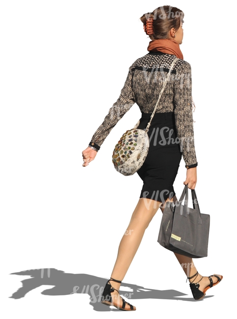 woman with a shopping bag walking