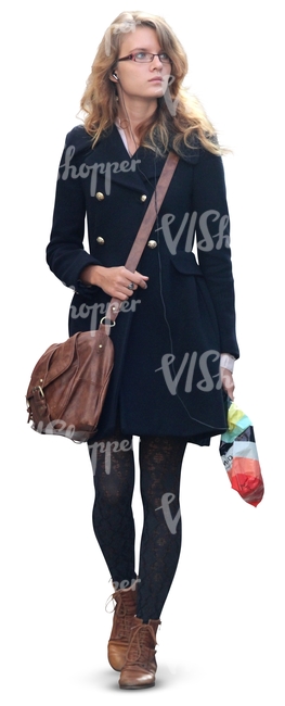 woman in a black coat walking