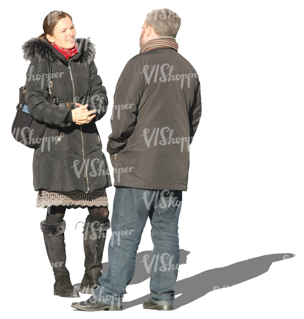 man and woman  talking in wintertime