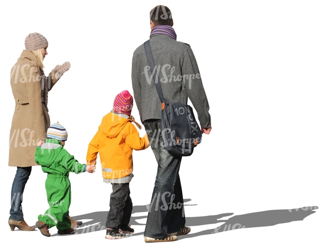 family of four walking hand in hand