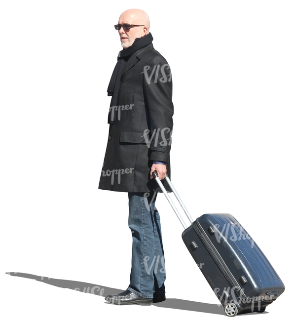 travelling man standing with a suitcase