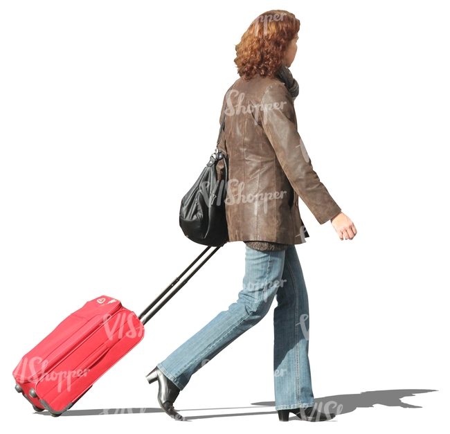 woman walking with a red suitcase