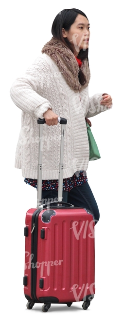 cut out asian woman standing with a suitcase