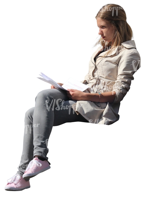 cut out blond woman sitting and reading