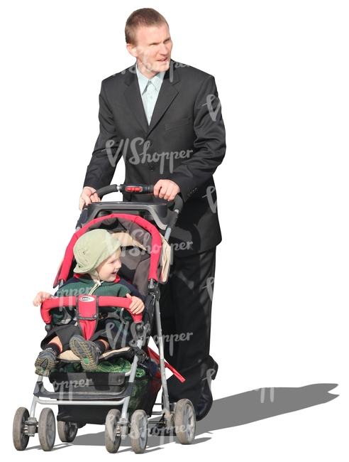 man in a suit pushing a baby stroller